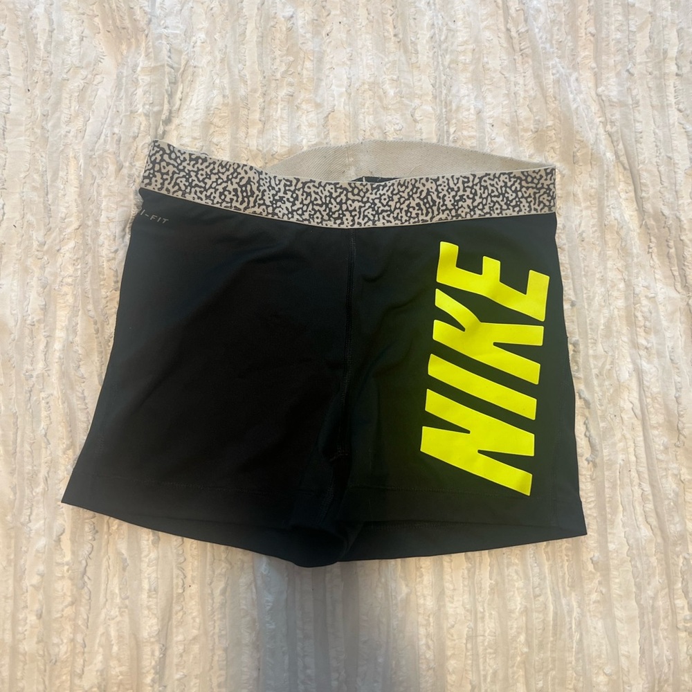 Nike Women's Black Shorts with Neon Yellow Logo